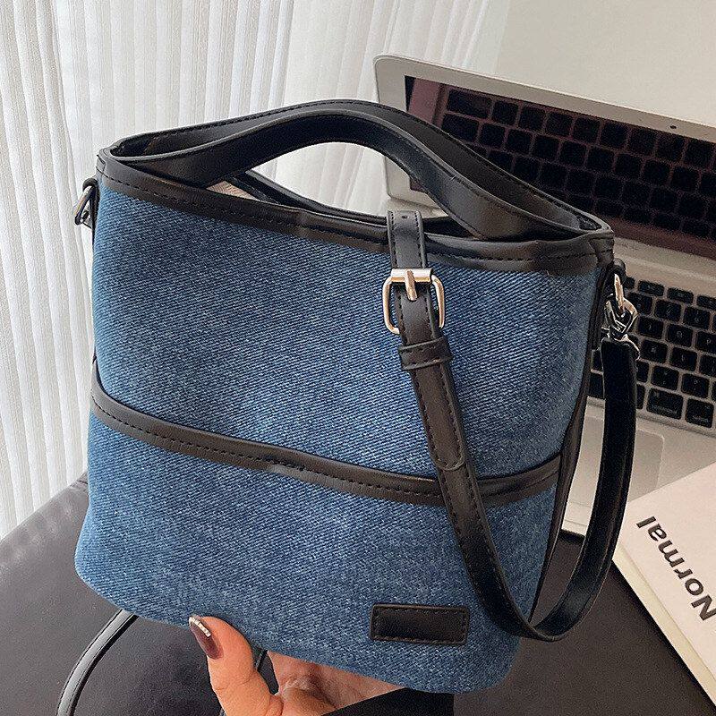 韩版手提水桶包包女2026春季新款简约撞色女包潮流休闲单肩斜挎包