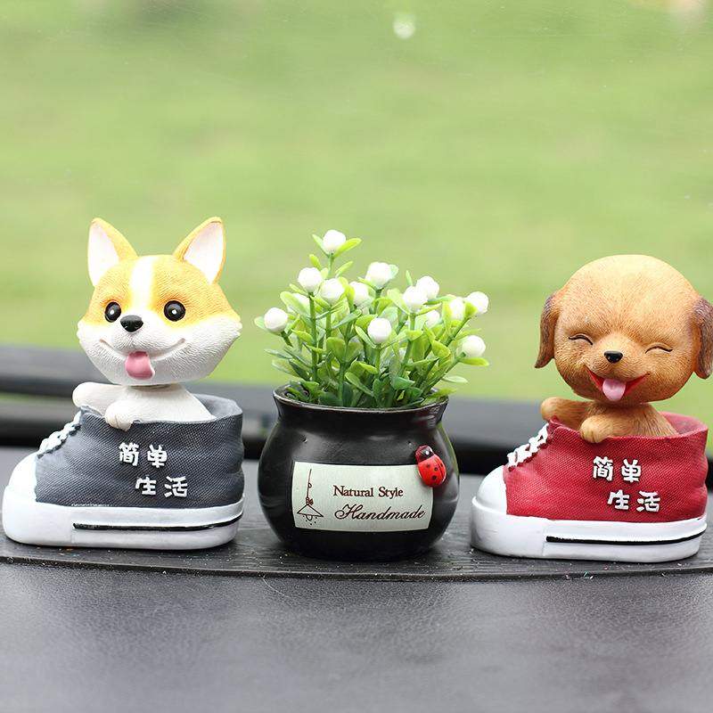 摇头狗汽车摆件创意仿真车载工艺品公仔装饰品可爱摇摆树脂宠物狗