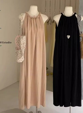 法式极简风纽结麻花挂脖连衣裙女秋打底吊带裙宽松气质度假风长裙