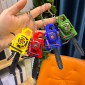 儿童仿真电锯钥匙扣彩色伐木锯包包挂件整蛊迷你抽拉震动小电锯