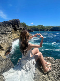 巴厘岛海边旅游拍照氛围感度假长裙超仙不规则碎花拖尾吊带连衣裙