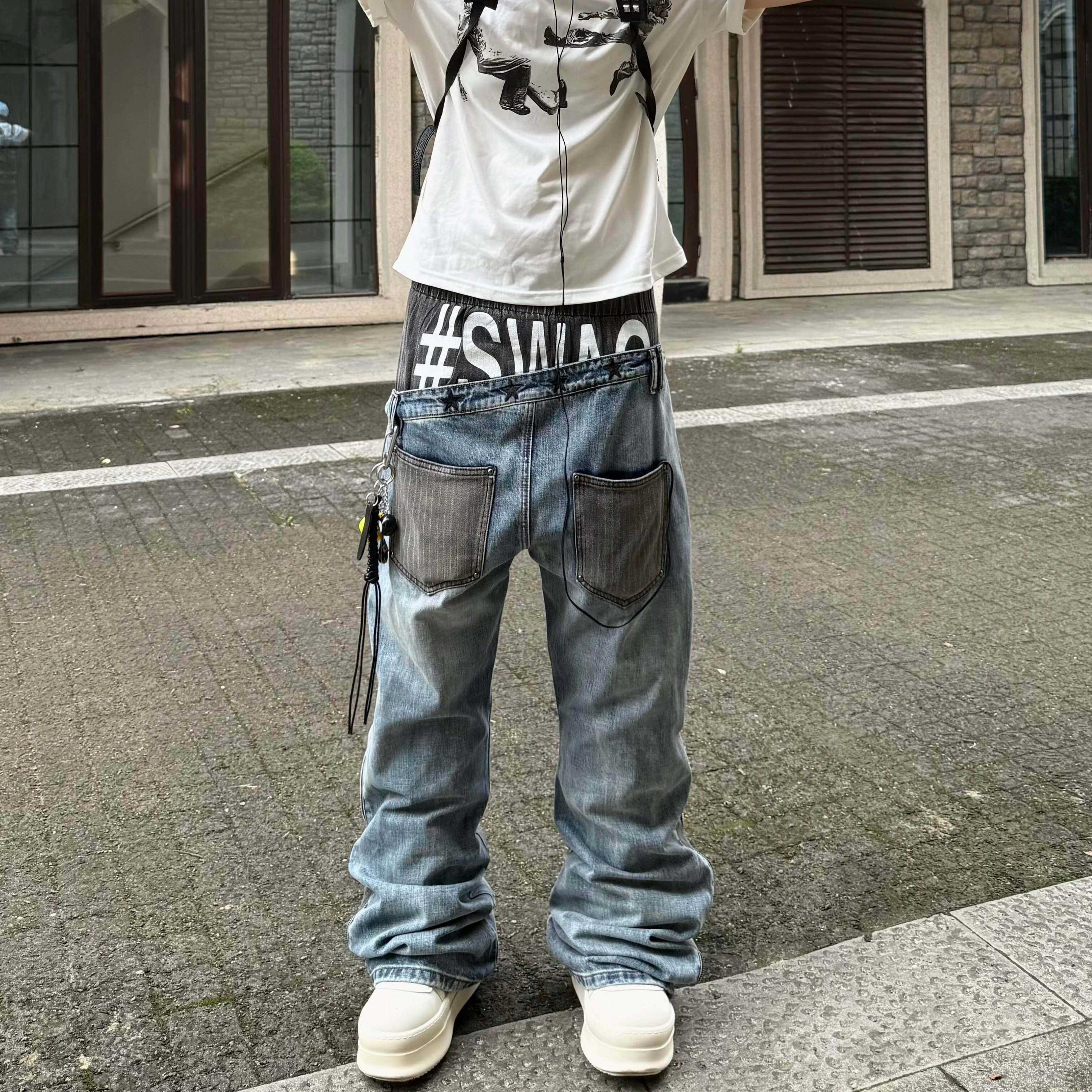 复古水洗印花绣花拼接条纹牛仔裤图片