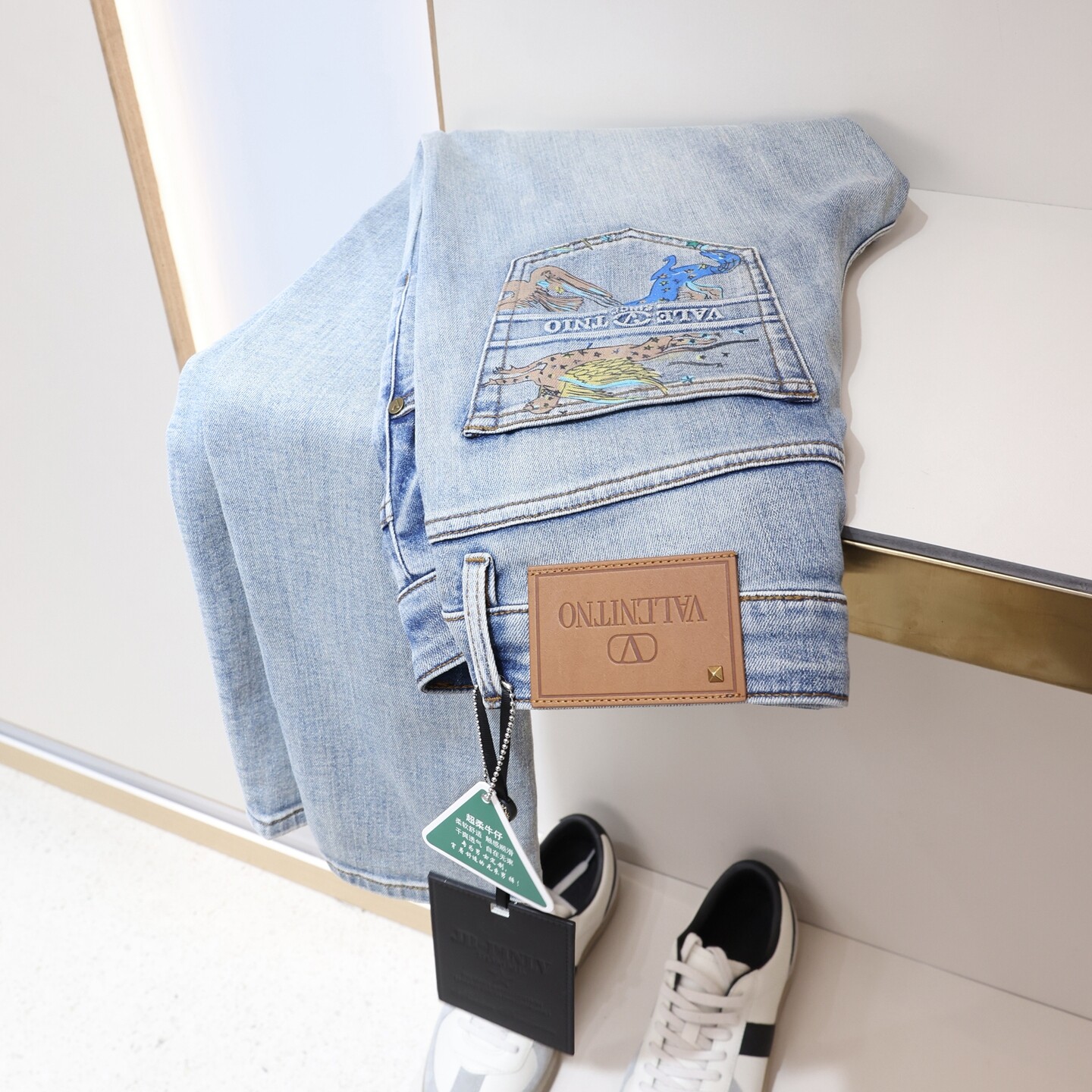 欧美潮流激光印花浅蓝色弹力牛仔裤男士春夏中腰修身小直筒休闲裤