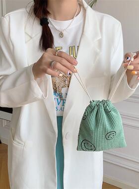 211191复古灯芯绒笑脸收纳袋抽绳束手提口化妆包杂物整理小款百搭