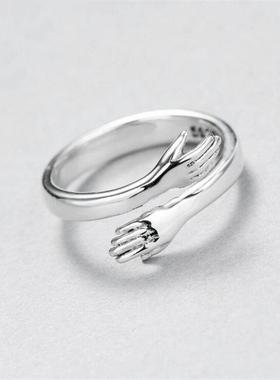 厂家直销新品镀银戒指创意拥抱你爱的拥抱怀抱手臂手开口可调戒指