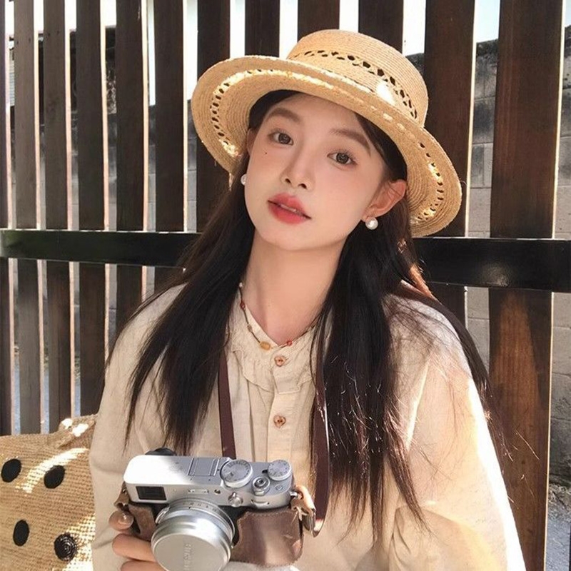 纯手工编织平顶草帽子女2025新款夏防晒镂空优雅礼帽出游