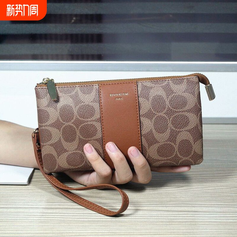 欧美时尚女士手拿包2026新款印花迷你手腕包装手机卡位手抓零钱包