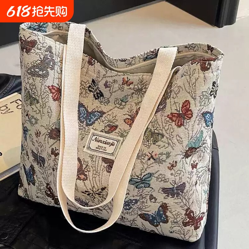 大容量帆布包包2025新款通勤托特包女ins外出单肩妈咪包手提斜