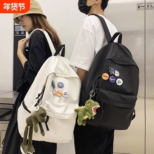 双肩包男士大容量旅行包登山包女初中大学生挂件背包书包黑色涤纶