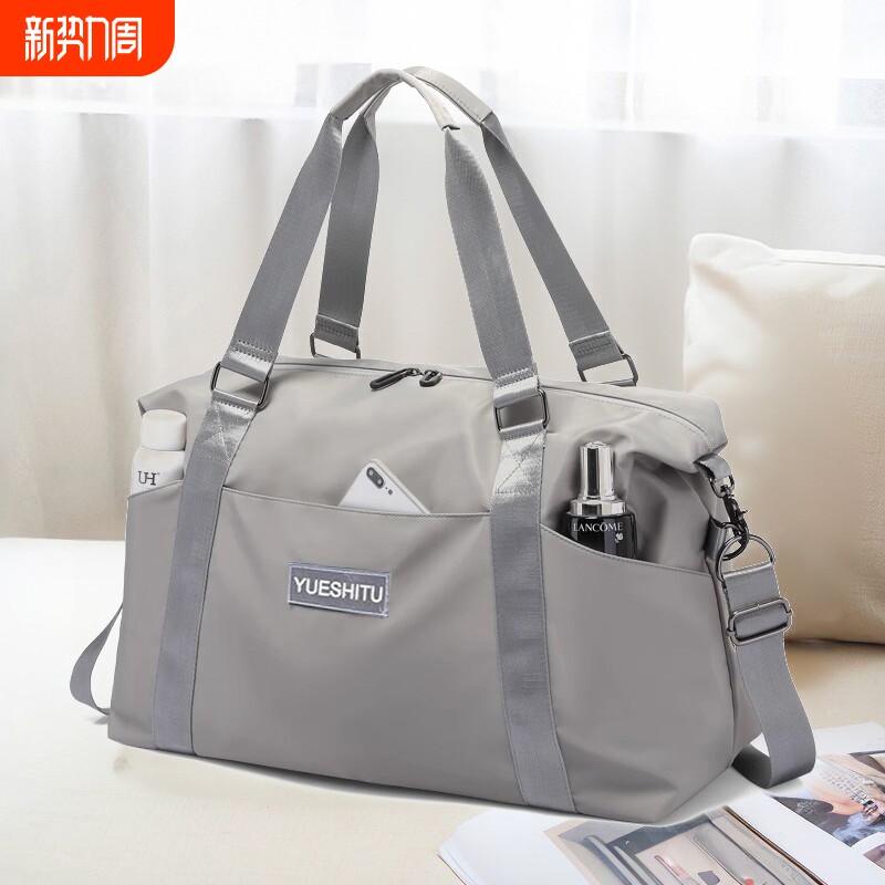 大容量手提短途旅行包女时尚轻便防水行李包男出差旅游收纳登机包