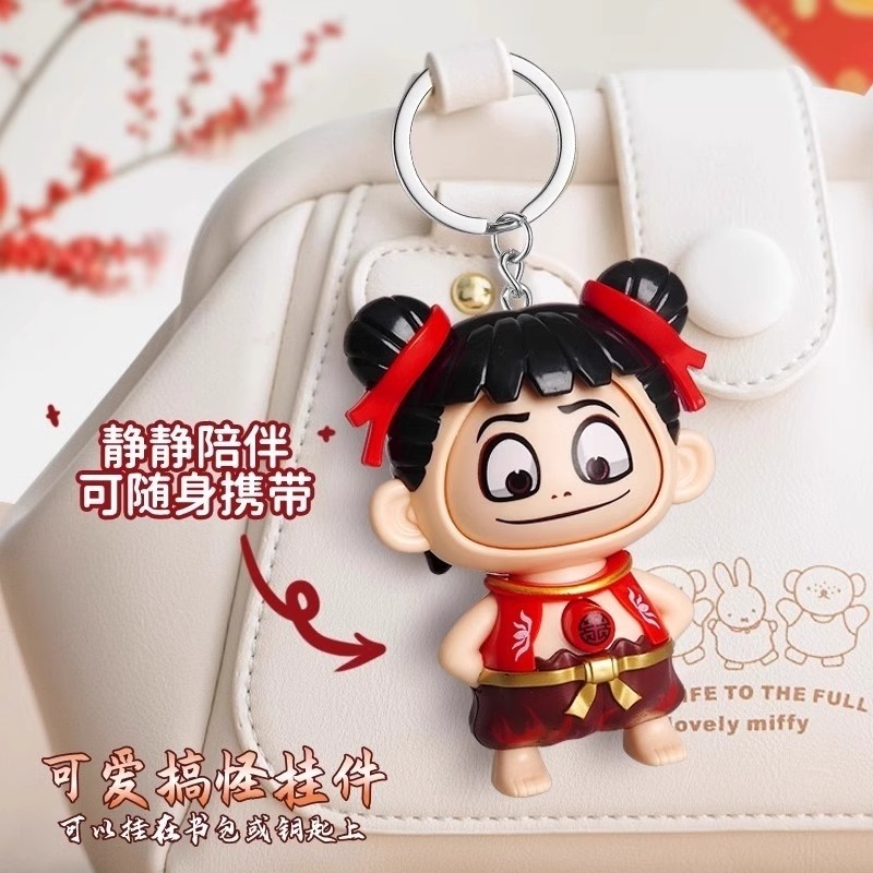 哪吒变脸玩具魔童闹海按压变脸钥匙扣学生书包挂件玩偶抖音爆款