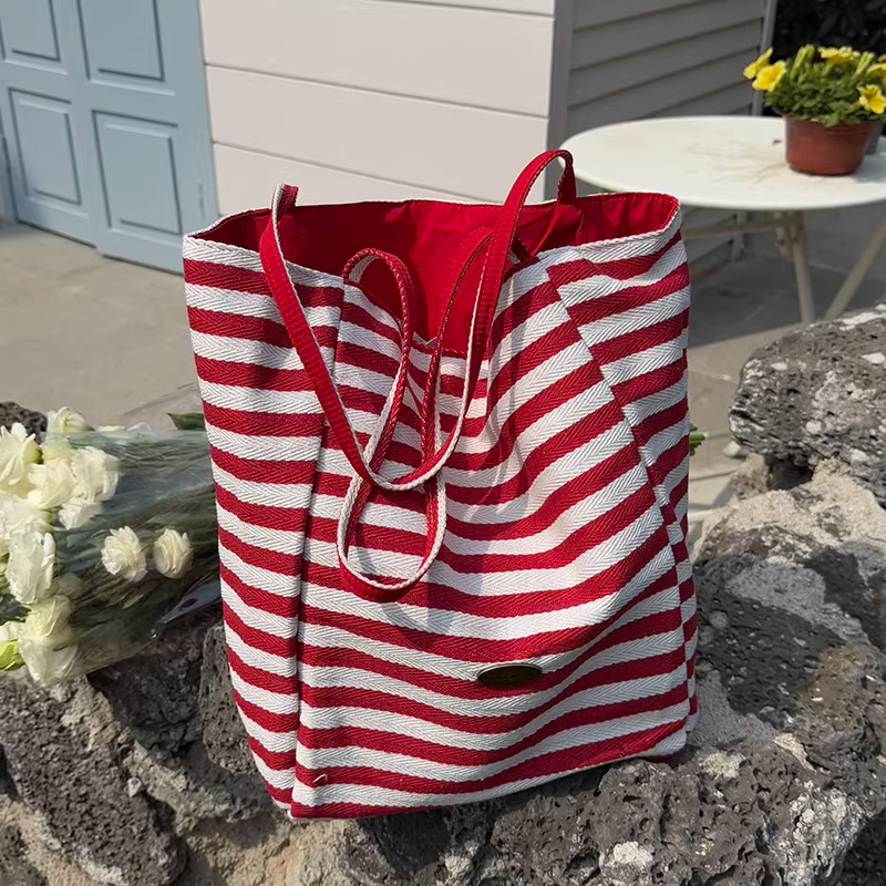 双面包帆布袋包包女式2025新款条纹韩托特包红色容量大单肩大容量