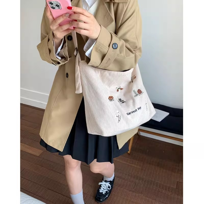 条绒刺绣帆布包包女大容量单肩通勤腋下包小众学生百搭斜挎托特包