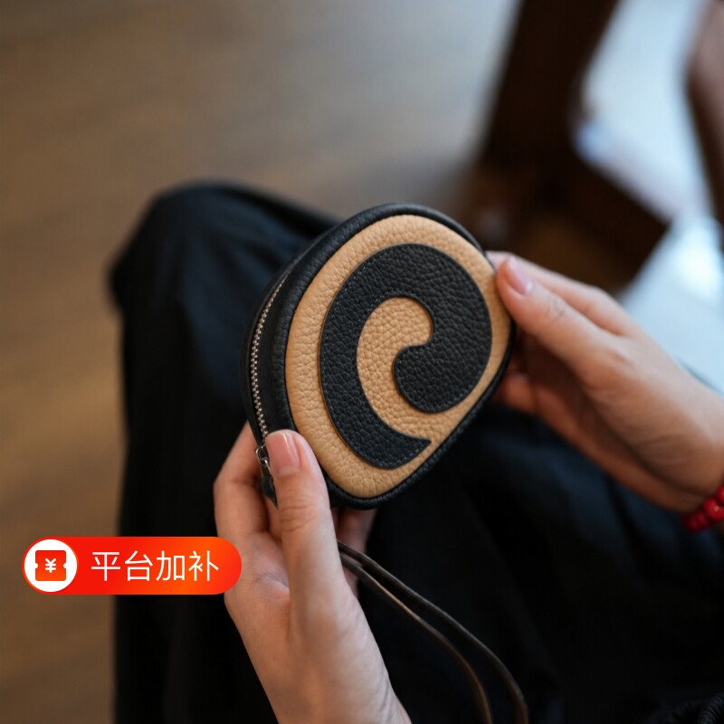 头层牛皮洋气可爱瑞士卷个性创意真皮零钱包口红钥匙耳机手拿包女