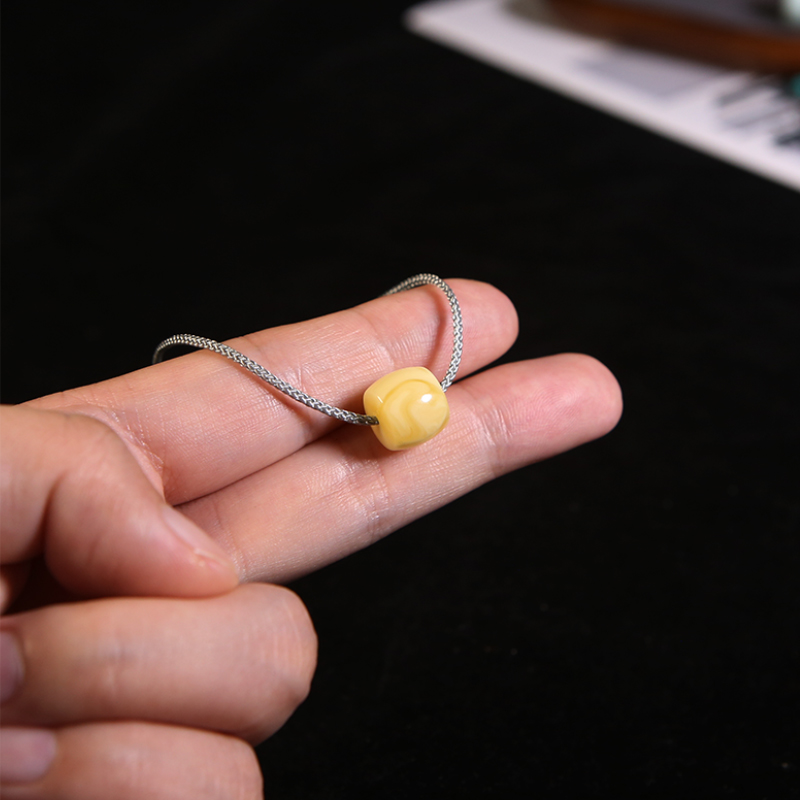 原矿保真蜜蜡直切桶珠1.5大孔