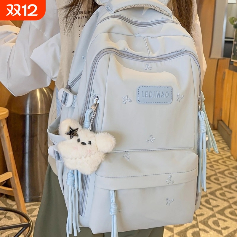 儿童书包女生小学生2025新款大容量初中生高中生多层轻便双肩背包