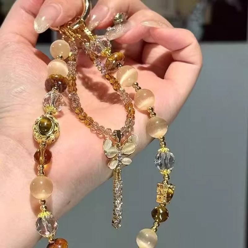 美拉德色系串珠蝴蝶流苏手机链小众精致百搭包挂件ccd相机挂发饰