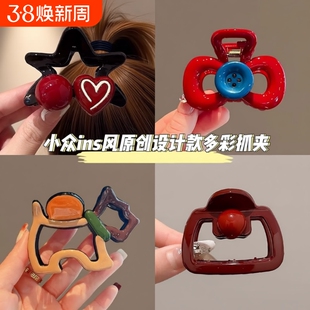 安哥拉鲨鱼夹抓夹红五角星高马尾女2024新款半扎发夹子头饰后脑勺