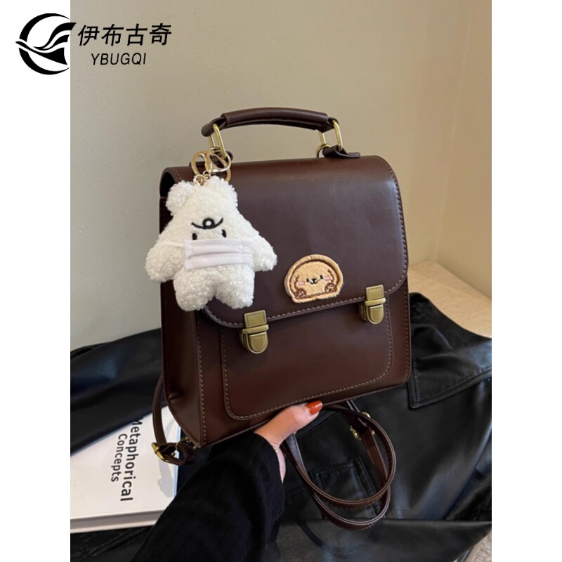 双肩包2025新款英伦学院风旅行包小众高级感复古可爱书包斜挎手提