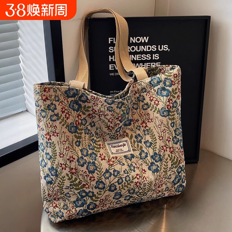 托特包女大容量2025新款手提袋上班通勤手提包碎花单肩帆布包结实