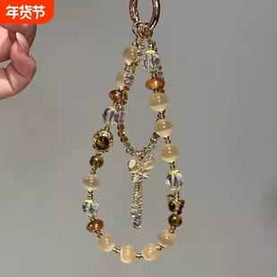 精致德虎眼色蝴蝶流苏手机链2025新款美拉百搭包挂件ccd相机发饰