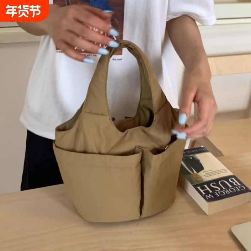 轻便尼龙布手提包包女2025新款小众设计菜篮子百搭通勤便当饭盒包,箱包皮具/热销女包/男包,水桶包,淘宝优惠券,粉丝福利购,淘宝优惠卷