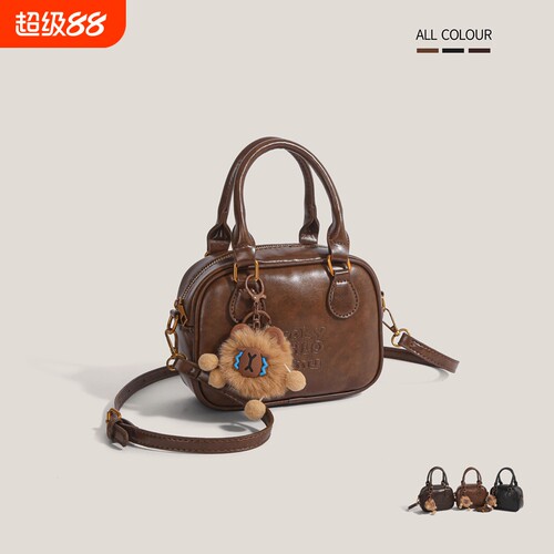 伊布古奇高级感复古手提枕头包包女2025新款时尚单肩包保龄球手工