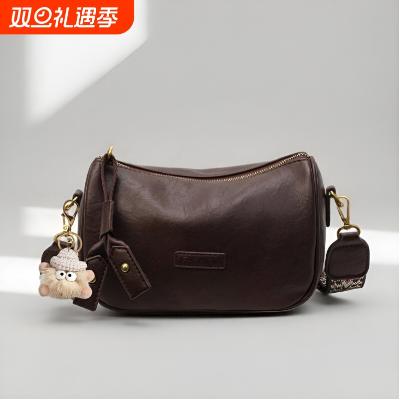 伊布古奇今年流行包包2025新款宽带斜挎包女士复古小众枕头包腰包