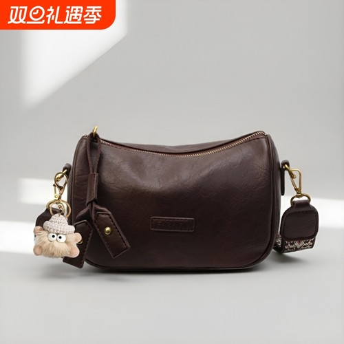 伊布古奇今年流行包包2025新款宽带斜挎包女士复古小众枕头包腰包