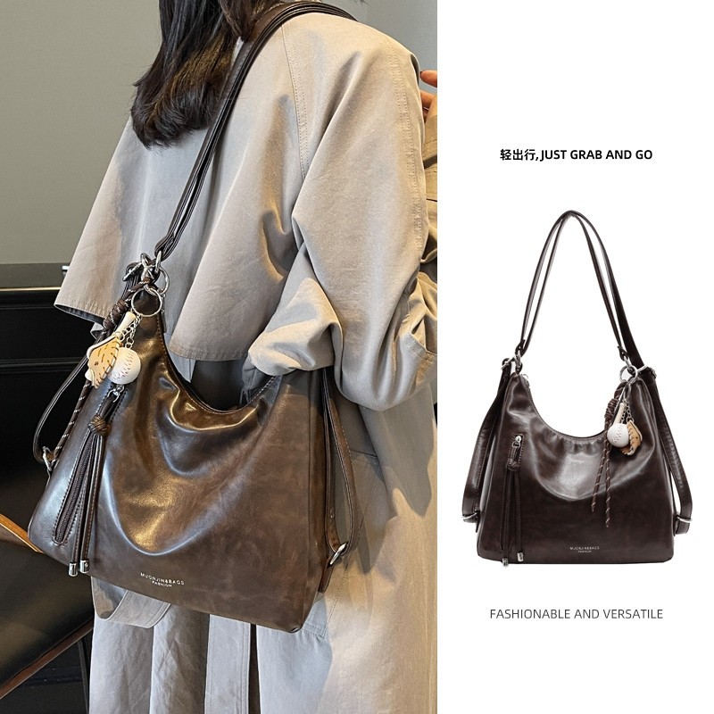 斜挎包大容量单肩通勤女包2025新款轻奢小众高级感托特包双肩包