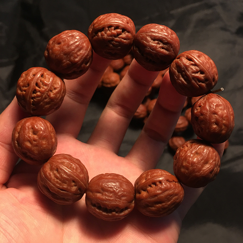 京八棱秋子手持串桩型饱满皮质油润机刷盘玩包浆元宝小核桃门头沟