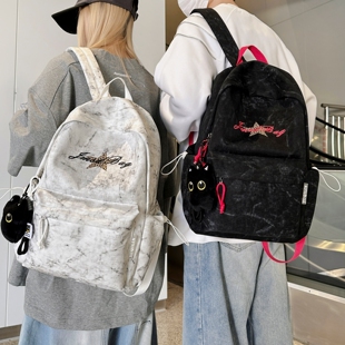 初中高中学生背包男女休闲韩系暗纹减负双肩包校园百搭大学生书包