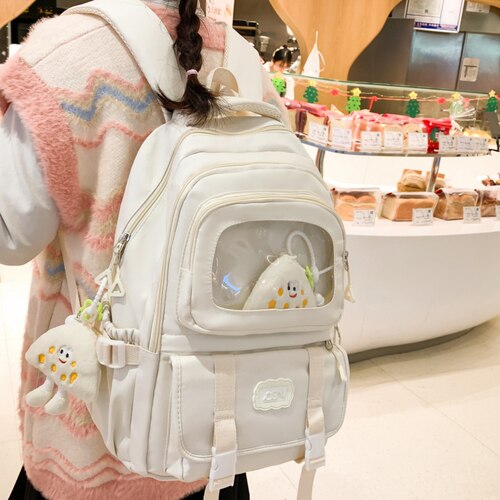 曼普森校园百搭书包女双肩包痛包