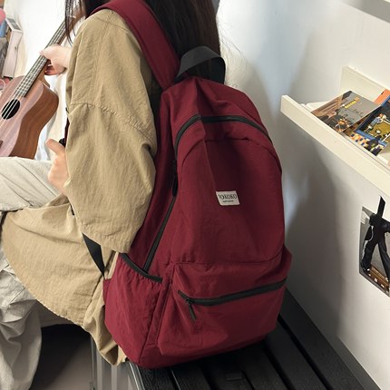 轻便韩版书包女高中大学生上课通勤背包男防水旅行百搭双肩包简约