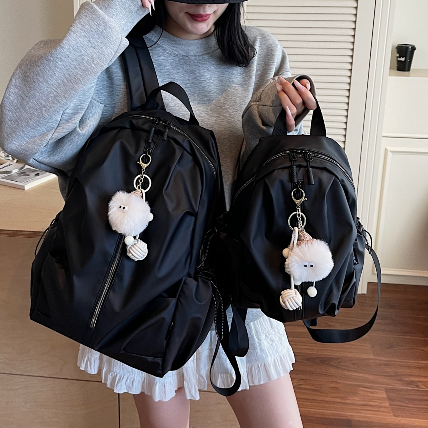 曼普森轻便防水大学生通勤双肩包