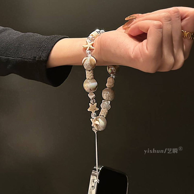 复古小众咖色玛瑙石贝壳海星手提绳适用所有手机壳型号便携挂绳个性高级感网红腕带女新款防丢失结实耐用短绳