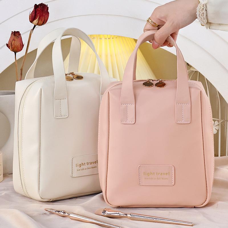 化妆包大容量高级感ins风高颜值tagi手提贝壳旅行便携化妆收纳包