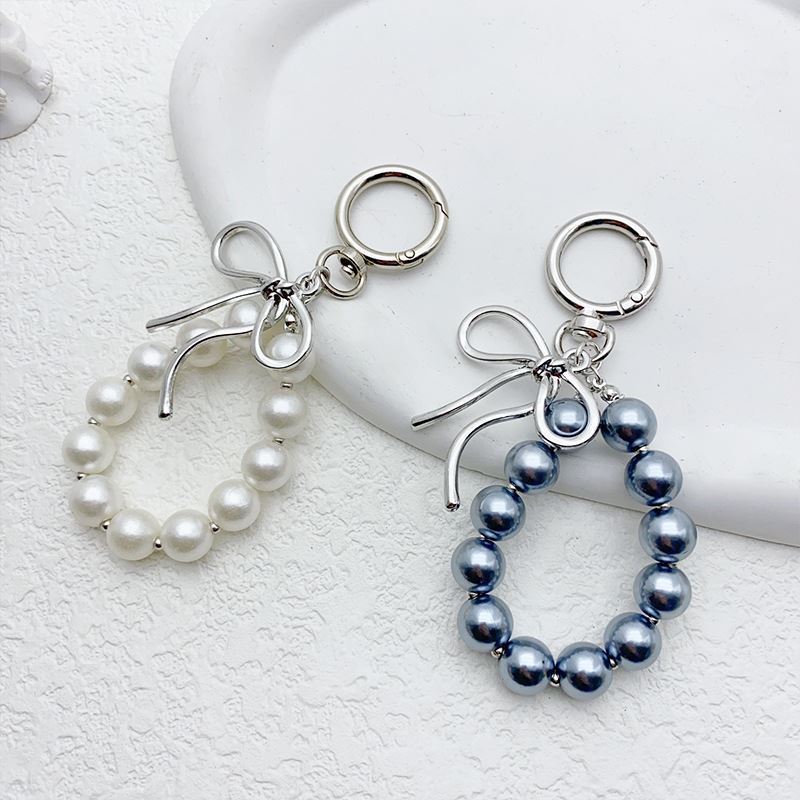 韩国nyunyu时尚金属蝴蝶结仿设计感手机包挂件车钥匙扣ins感