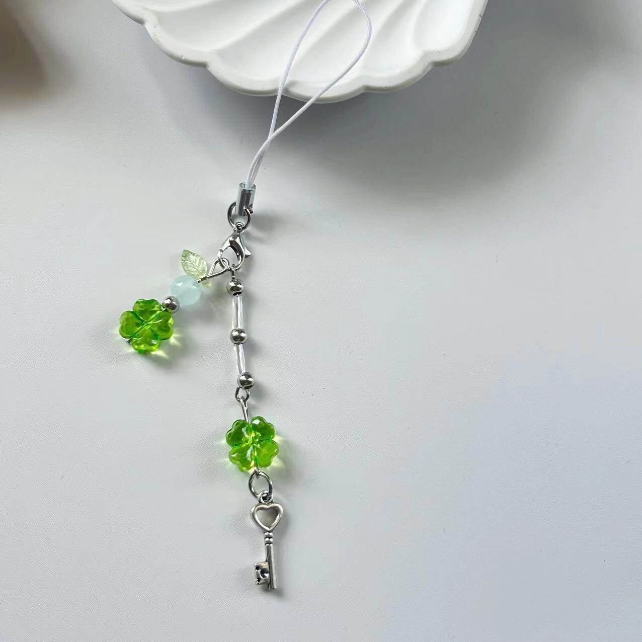 创意清晰甜美绿色幸运草串珠手机链咕本链钥匙链少女卡册挂件批