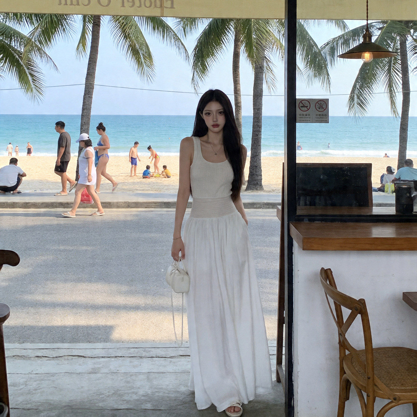 专柜黑色掐腰露背吊带连衣裙女2025夏新款长裙气质高级感背心裙K0