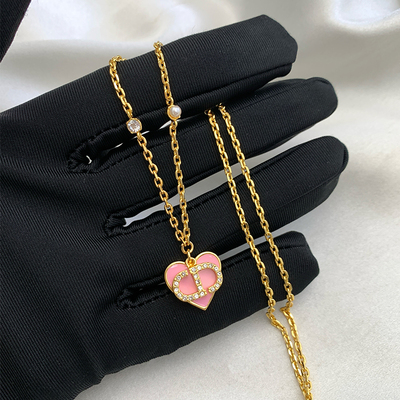 迪奥新款粉色爱心吊坠项链CD字母