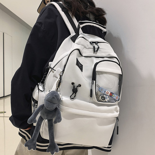 MX新款中学生书包男初大容