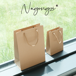 牛皮袋子手提袋服装店手拎袋包装袋批发定做印刷logo大号礼品纸袋