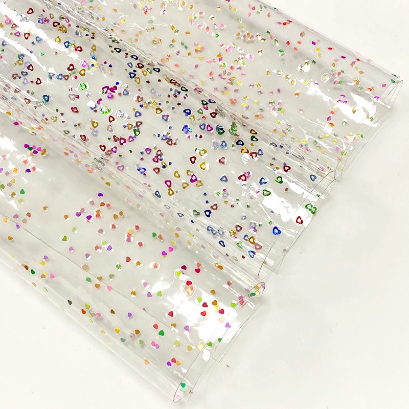 厂家批发星星珠片0.4MM透明膜亮片透明PVC膜  手袋箱包鞋材面料