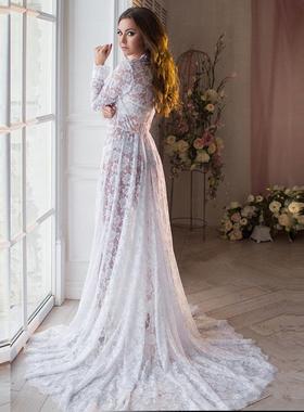 White deep neck long sleeved lace tight fitting trailing