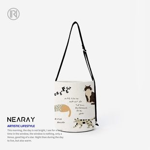 韩系慵懒感水桶包可爱印花帆布包通勤百搭斜挎包大容量带拉链Q345
