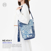 尼睿2025新款 原创青花文艺休闲帆布包大容量日常通勤水桶包Z017