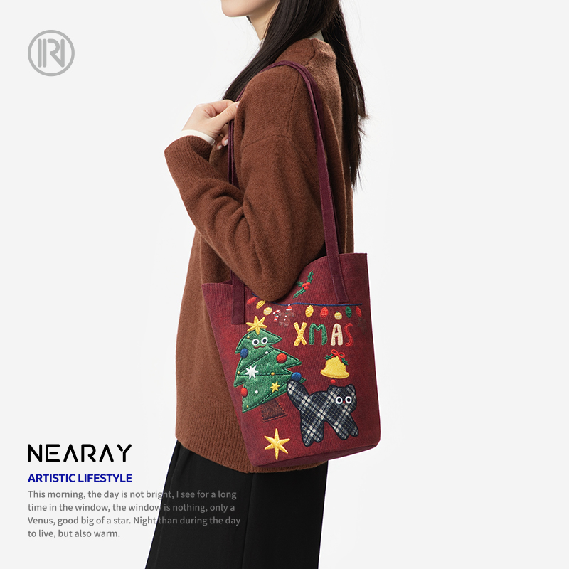 尼睿格纹小猫印花酒红帆布包