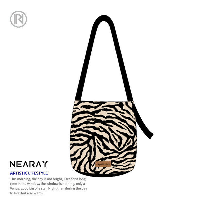 尼睿原创插画师斑马纹飘带水桶包单肩女百搭手提小众通勤包包AS,箱包皮具/热销女包/男包,通用款女包,淘宝优惠券,粉丝福利购,淘宝优惠卷