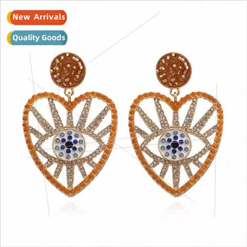Exaggerated rice beads heart-shaped eye earrings retro alloy
